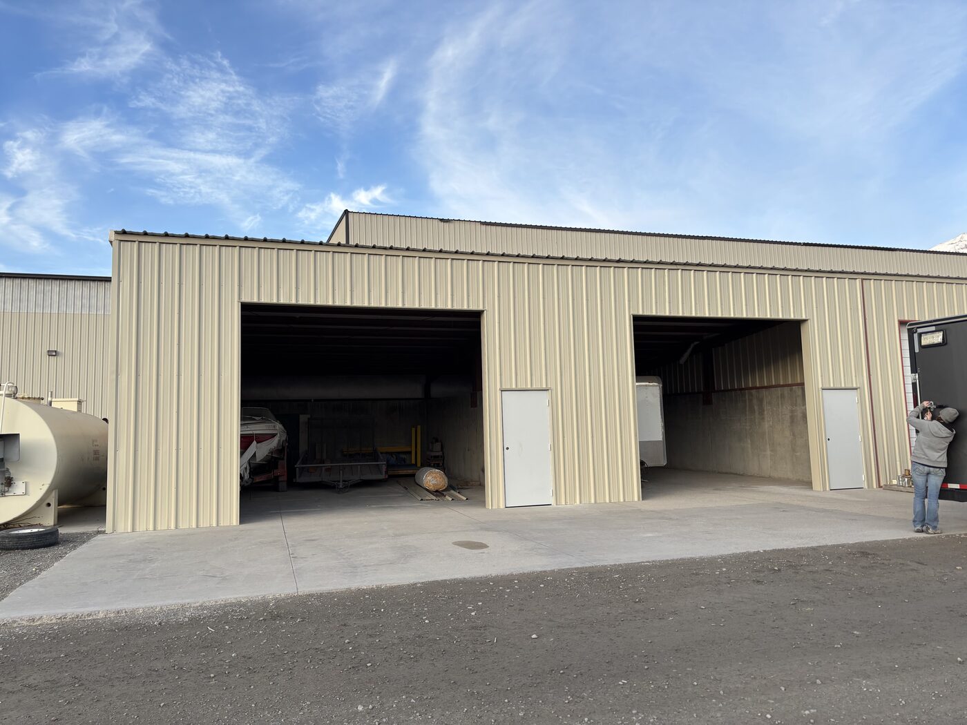 Completed metal building with garage doors