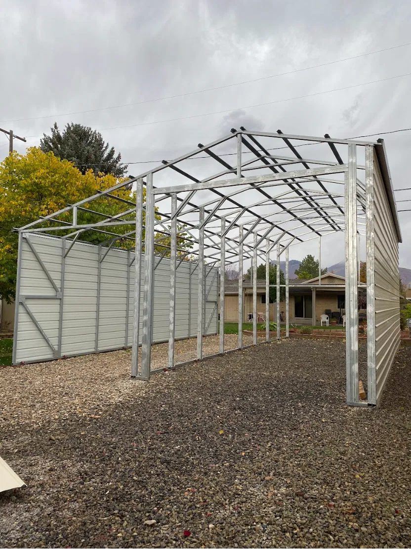 Steel shop framing on a residential lot in Utah County